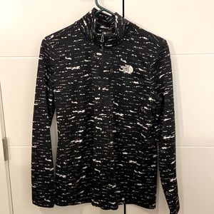 Long sleeve, quarter zip, black with white splatter pattern